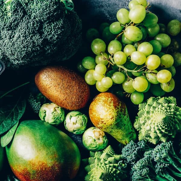 Variety of Green Vegetables and Fruits on the grey background, banner size